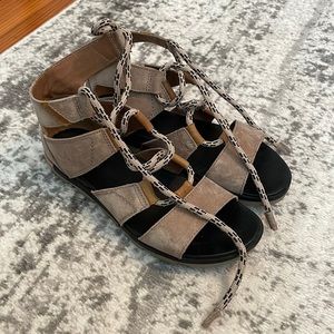 Sorel tan tie sandals. Size 10